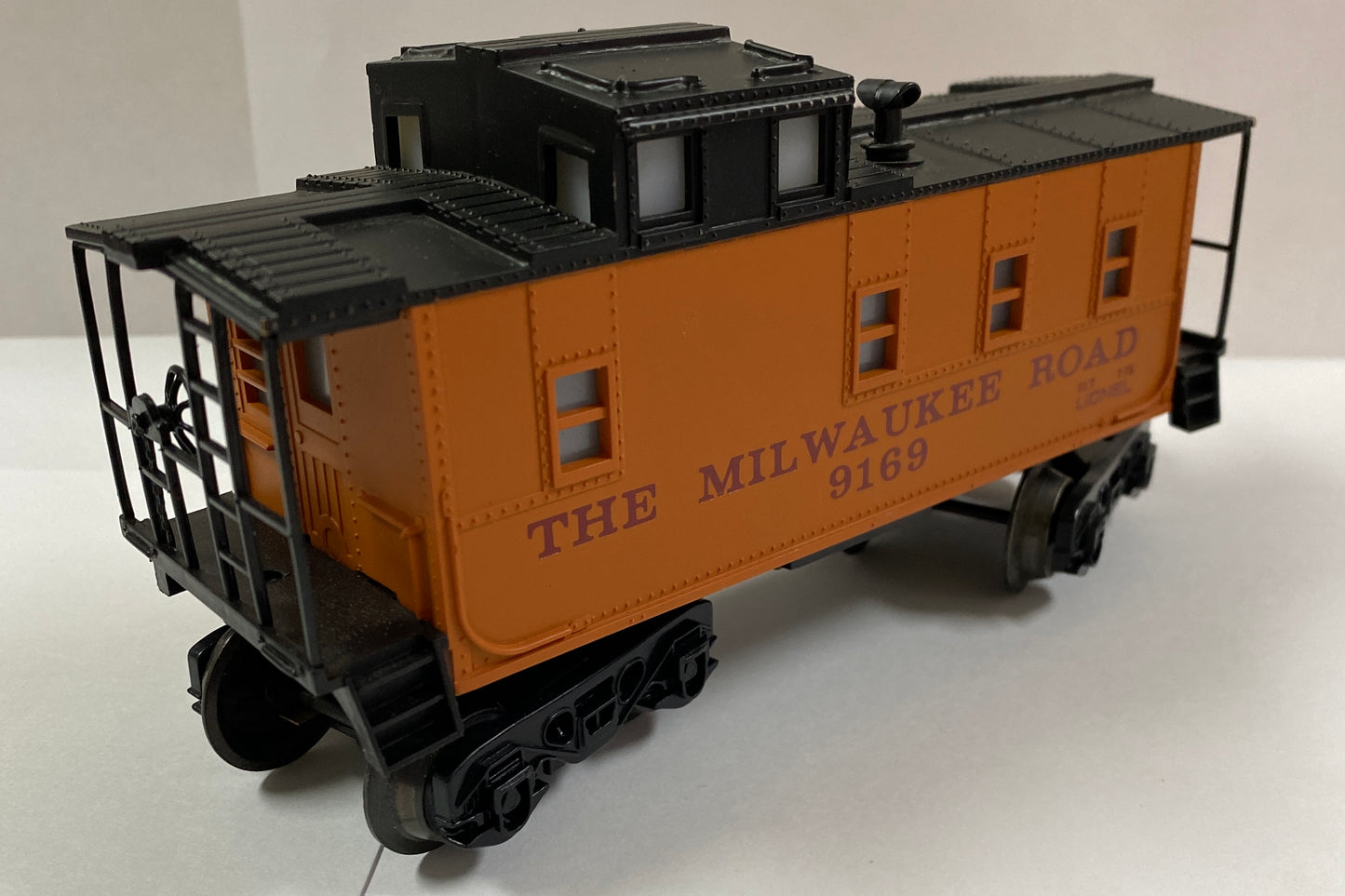 Lionel 6-9169 Milwaukee Road Illuminated Caboose | Condition is *USED*